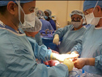 Image of top docters opperating in theatre
